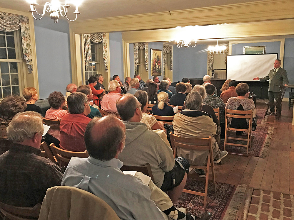 A packed house is typical of the popular Third Thursday Lecture Series at the Stroud Mansion.